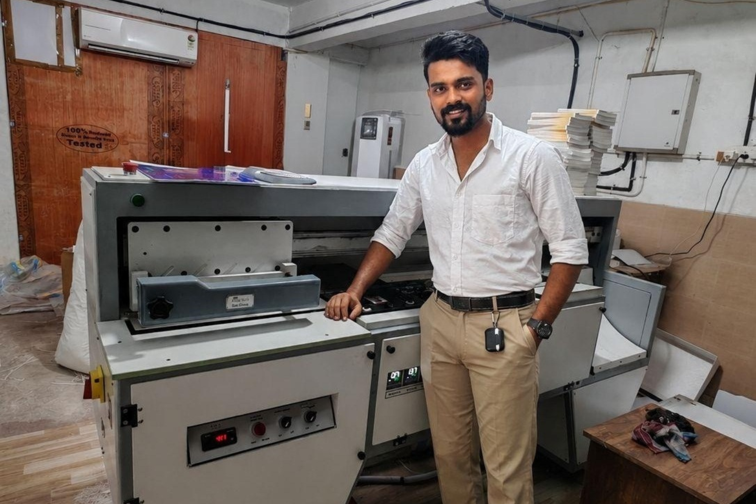 Team Inspire Digital Media's production facility in Thiruvananthapuram, Kerala, equipped with in-house printing and Bindwel binding systems for book and commercial print production.
