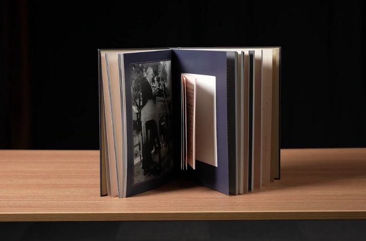 Printed books displayed at an industry jury meet, featuring advanced binding techniques, gilded edges, and pop-up elements demonstrating modern book manufacturing quality