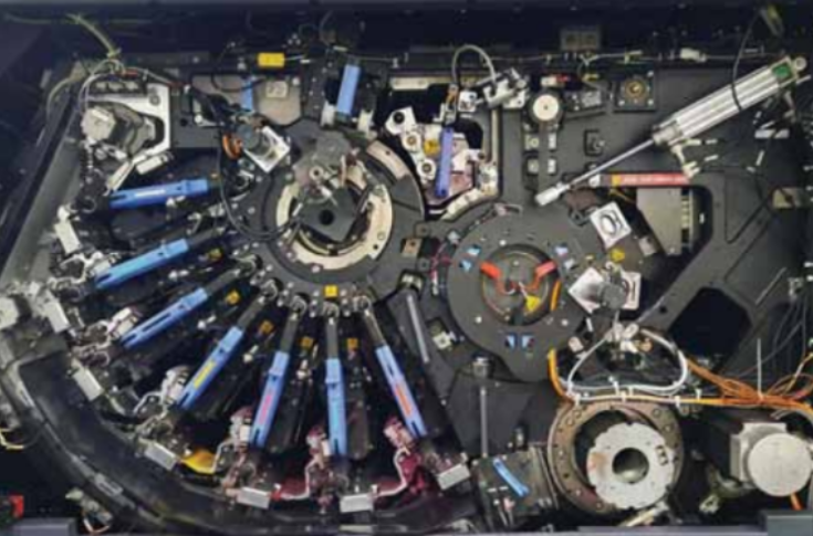 Modern print production facility with multiple digital and hybrid printing machines including inkjet, electro-photography, and embellishment systems, representing advanced hybrid print technology and innovation in the printing industry